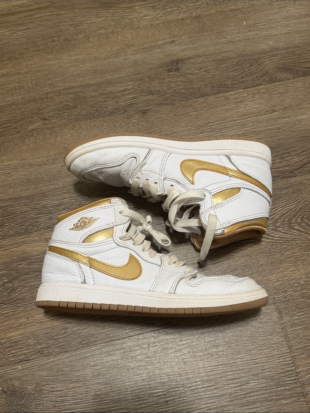 Nike Air Jordan 1 Retro High OG in the "Metallic Gold"
